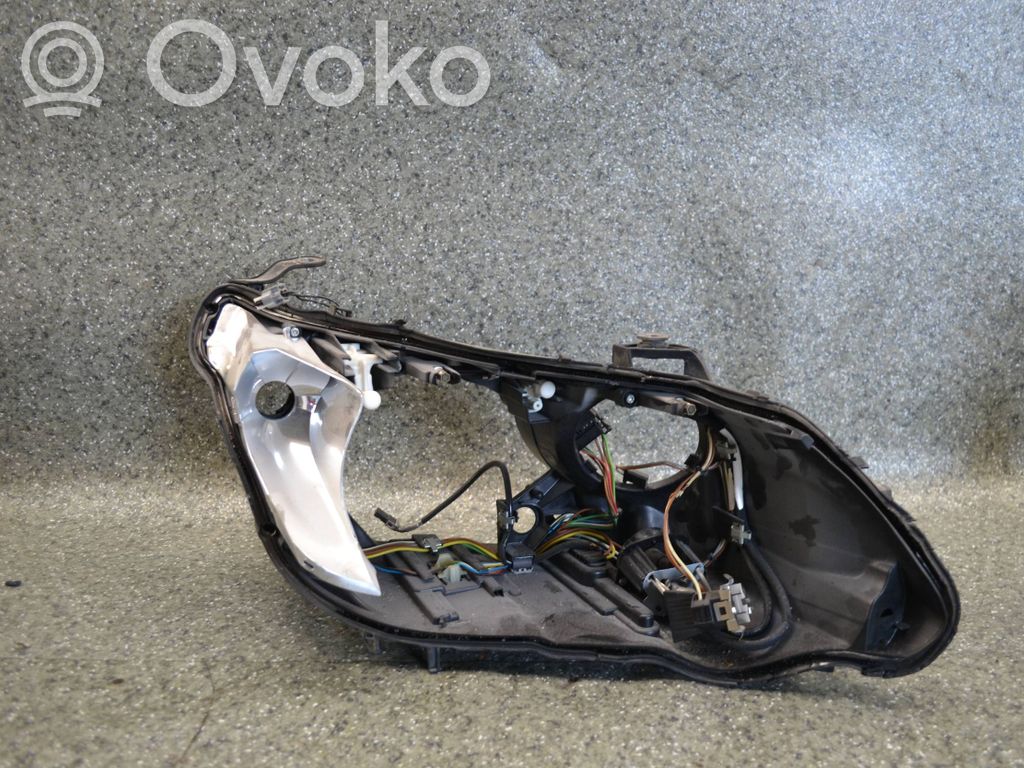 BMW 5 E60 E61 Uchwyt / Mocowanie lampy przedniej 