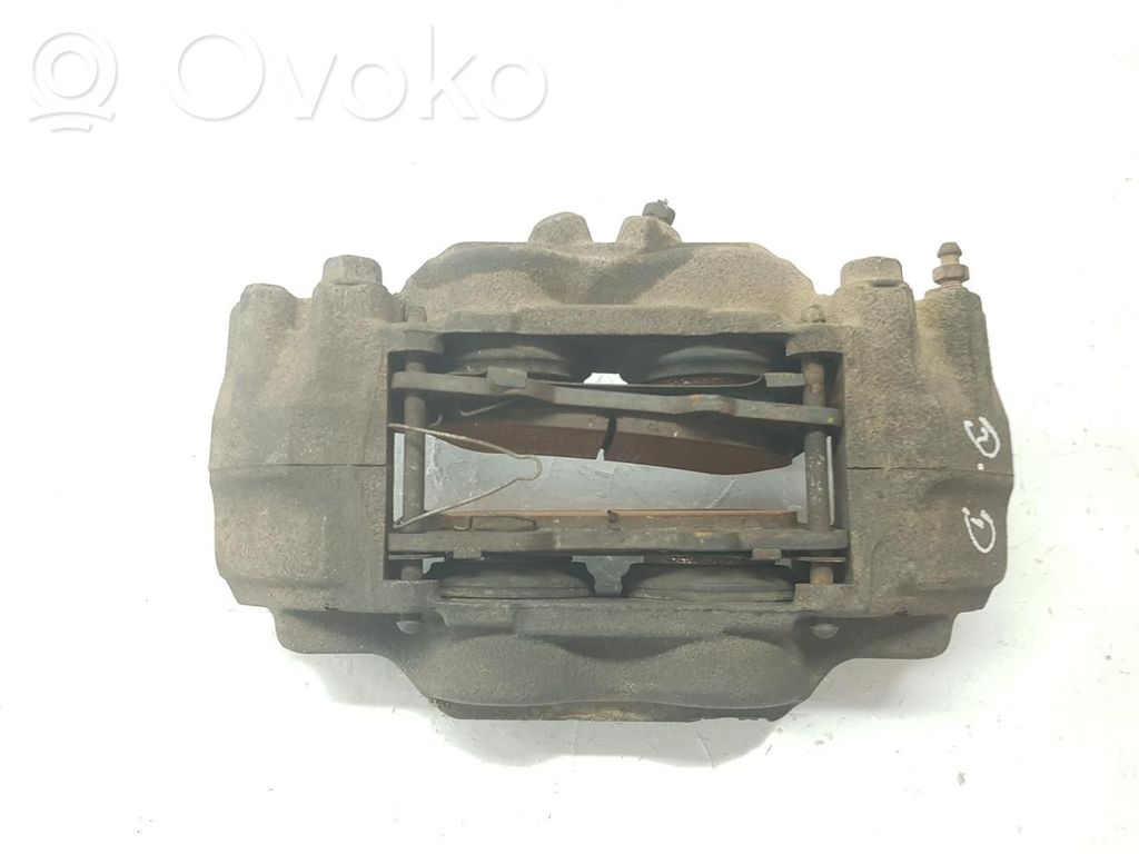 Toyota Land Cruiser (J120) Zacisk hamulcowy przedni 