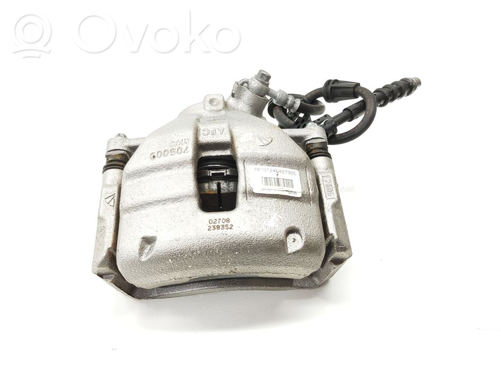 Opel Astra L Zacisk hamulcowy przedni 