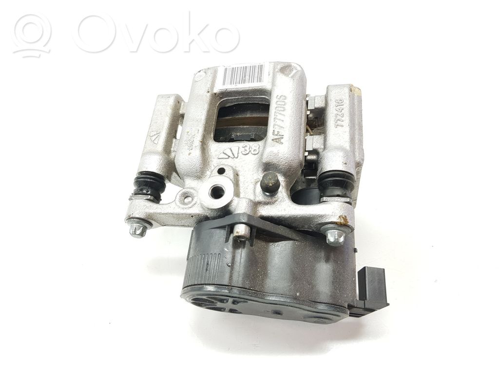 Opel Astra L Tylny zacisk hamulcowy 