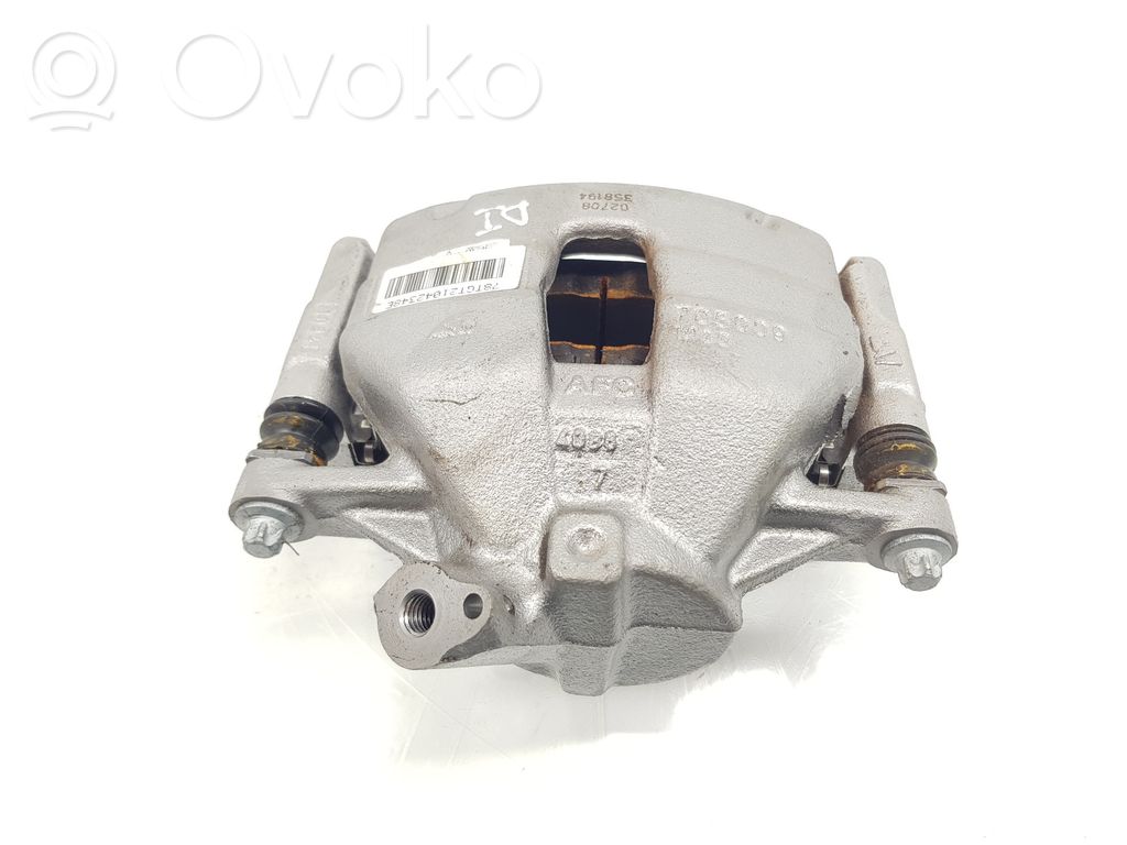 Opel Astra L Zacisk hamulcowy przedni 