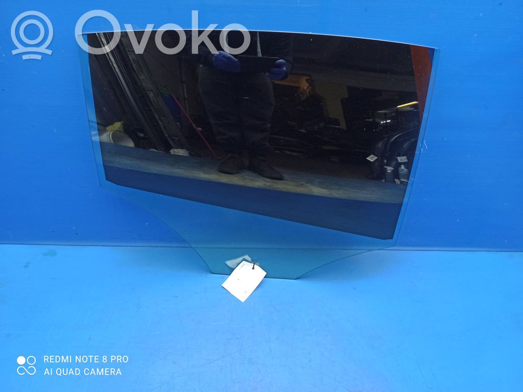 Jaguar XF Rear door window glass 