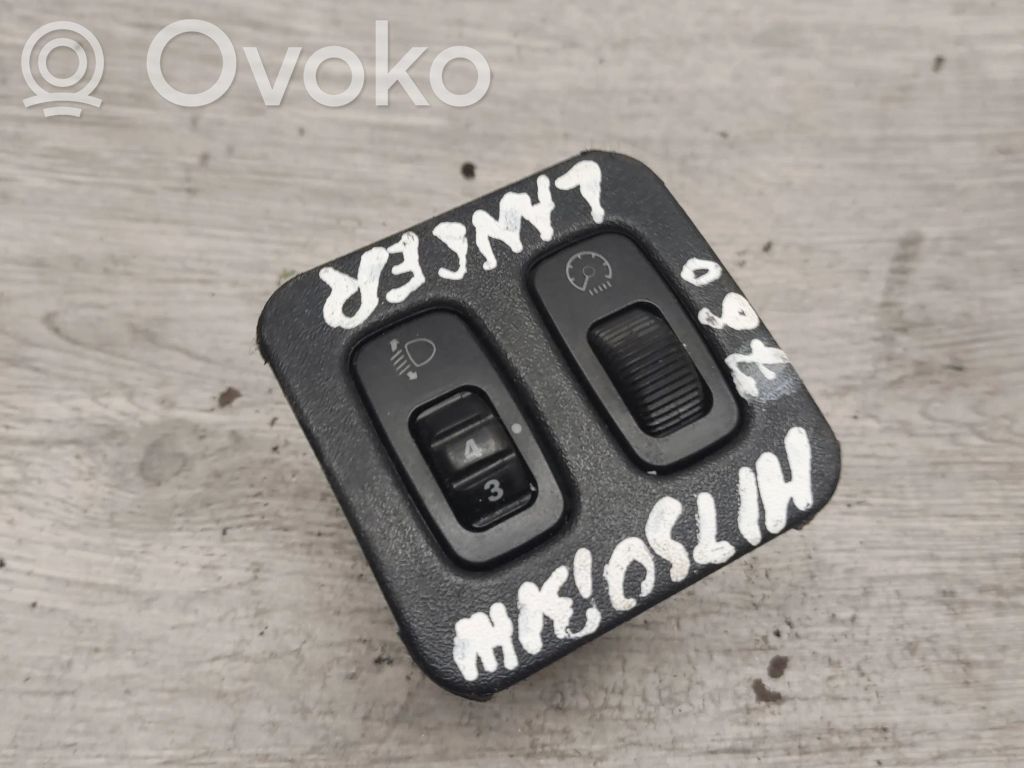Mitsubishi Lancer Headlight level height control switch 