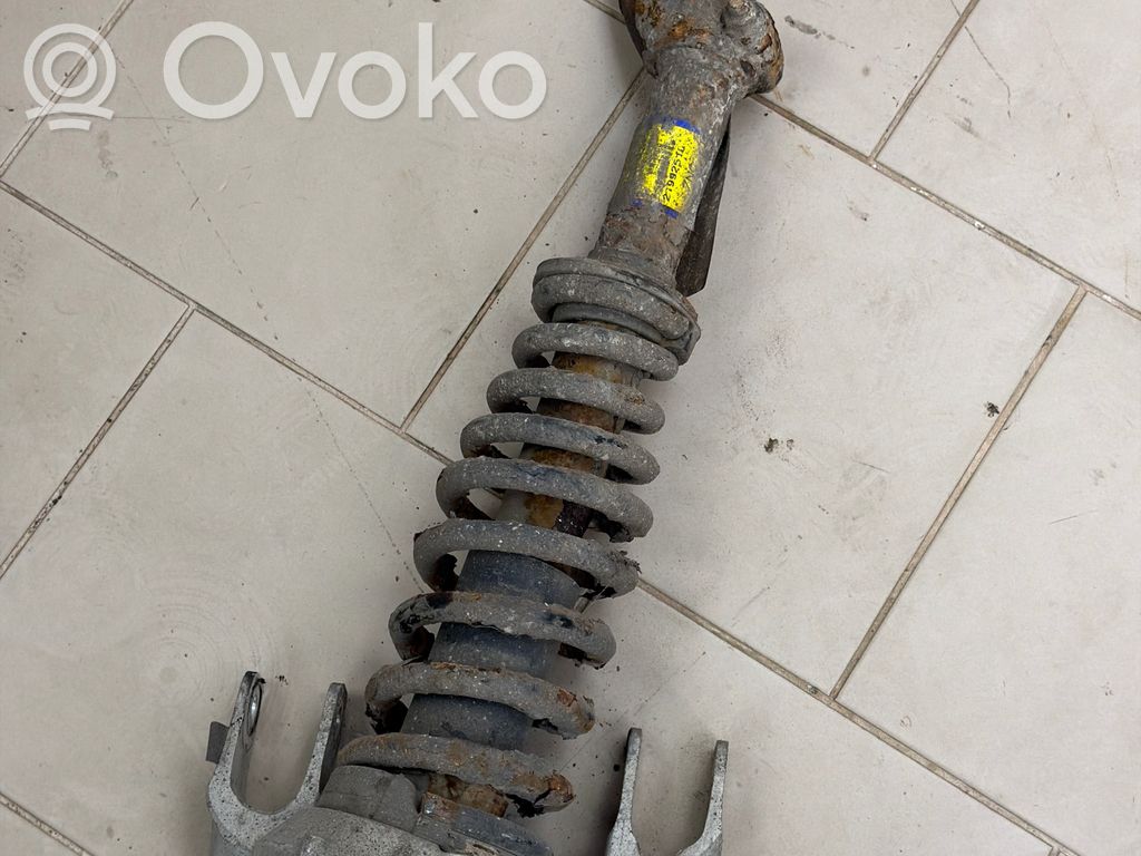 Amortyzator osi przedniej ze sprężyną   21992510