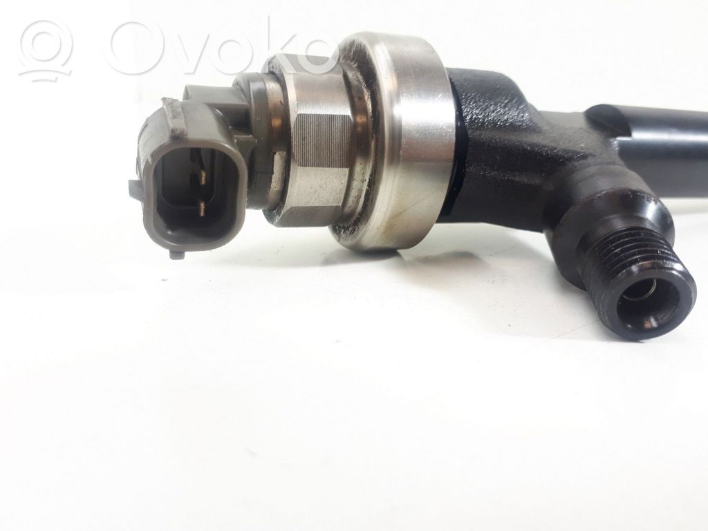 Inyector de combustible