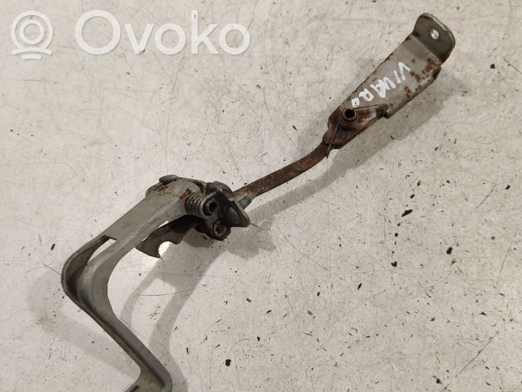 Loading door check strap stopper