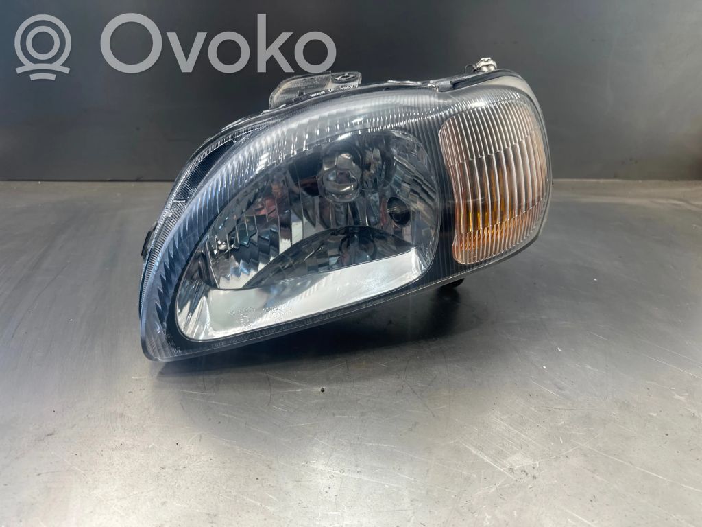 Suzuki Baleno EG Lampa przednia 