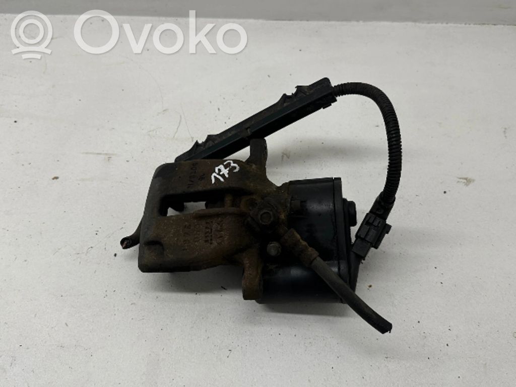 Volkswagen PASSAT B7 Tylny zacisk hamulcowy 