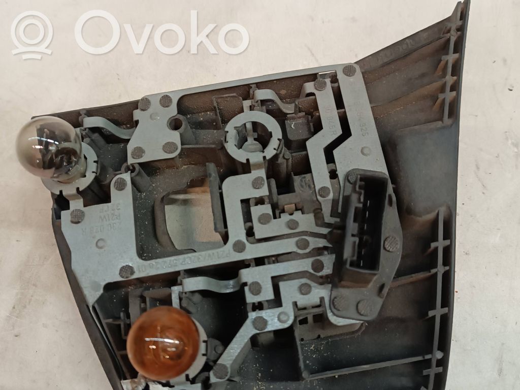 Tail light bulb cover holder   9336