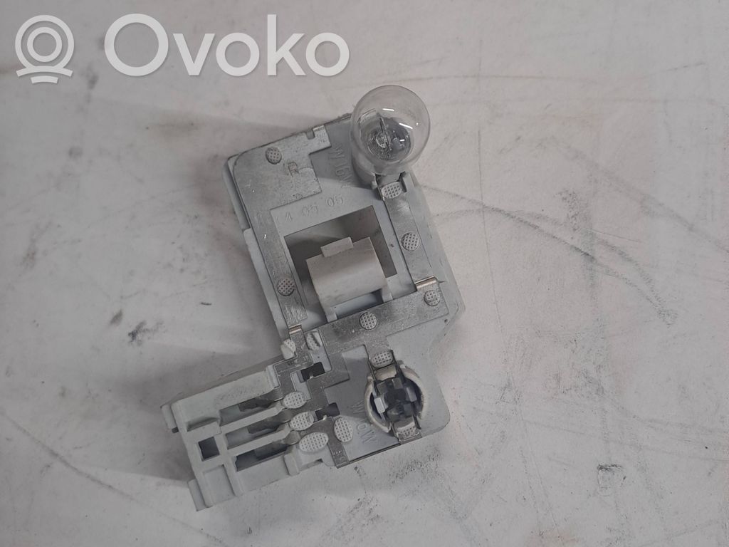 Tail light bulb cover holder   6935332