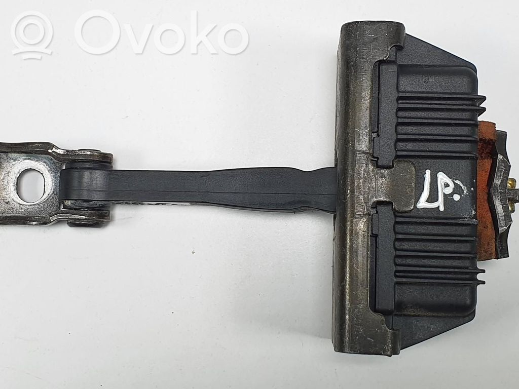 Front door check strap stopper   7026384,7026384