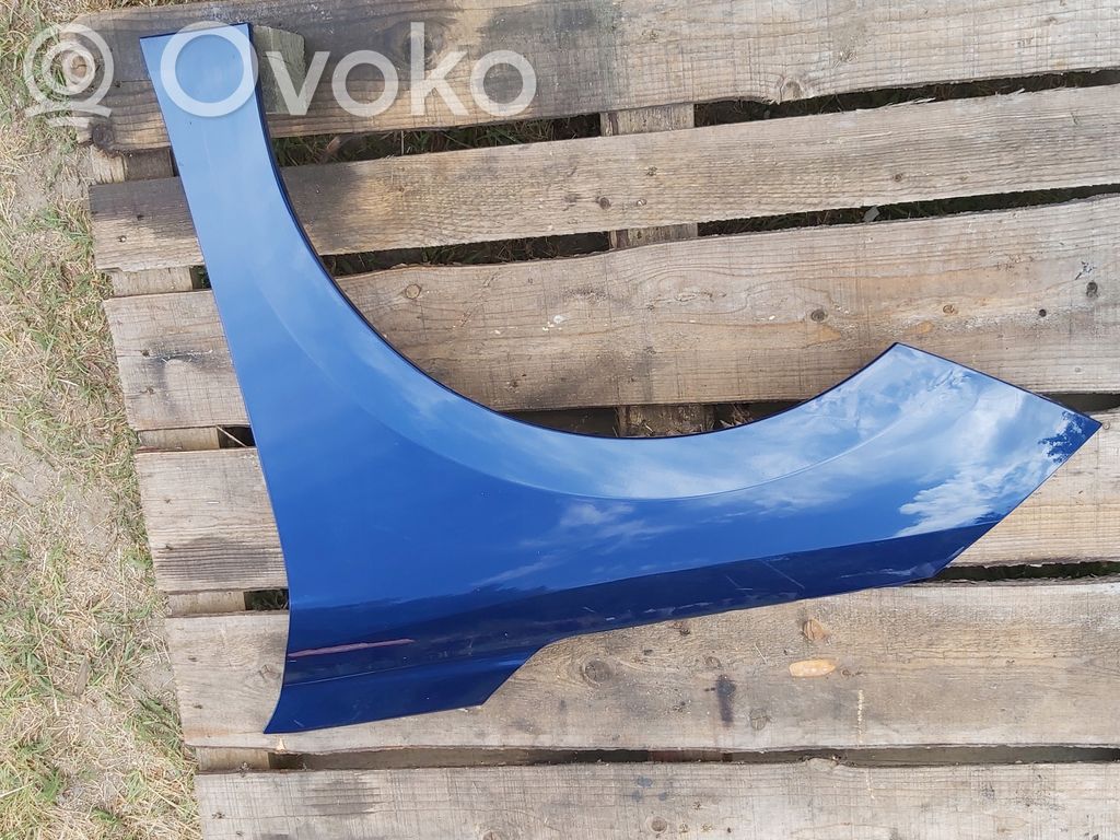 Opel Corsa F Błotnik przedni 
