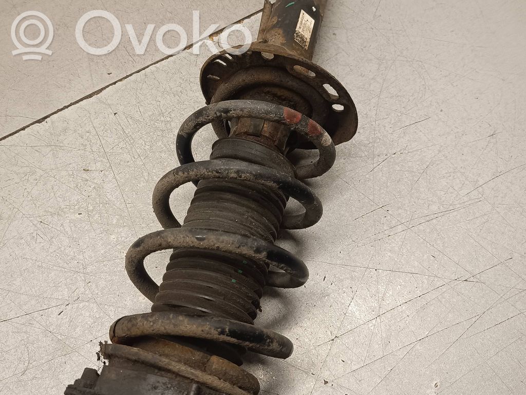 Amortyzator osi przedniej ze sprężyną   7N0413031Q