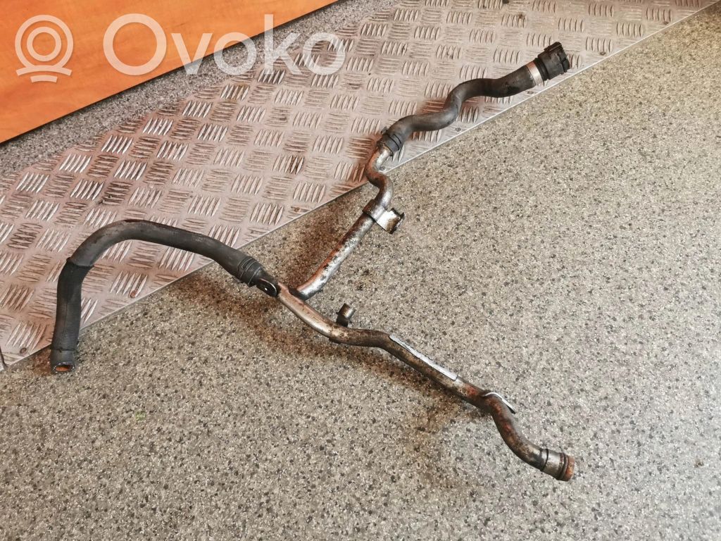 Opel Corsa E Engine coolant pipe/hose 