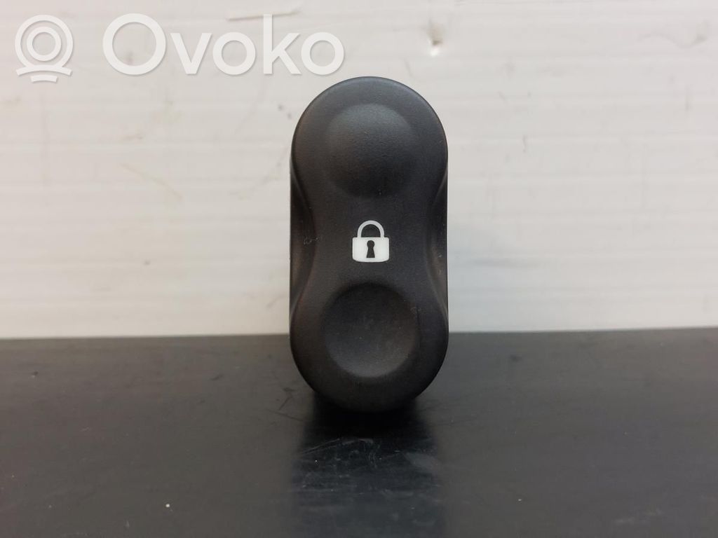 Botón interruptor de bloqueo de puertas