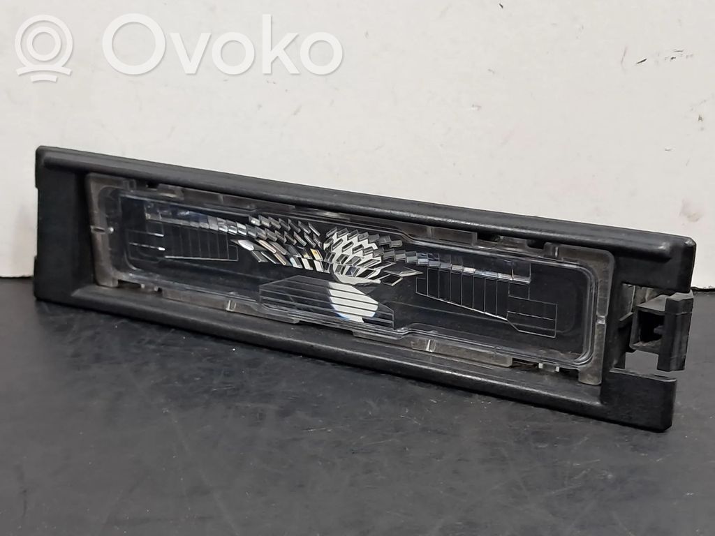 Dacia Spring Éclairage de plaque d'immatriculation 