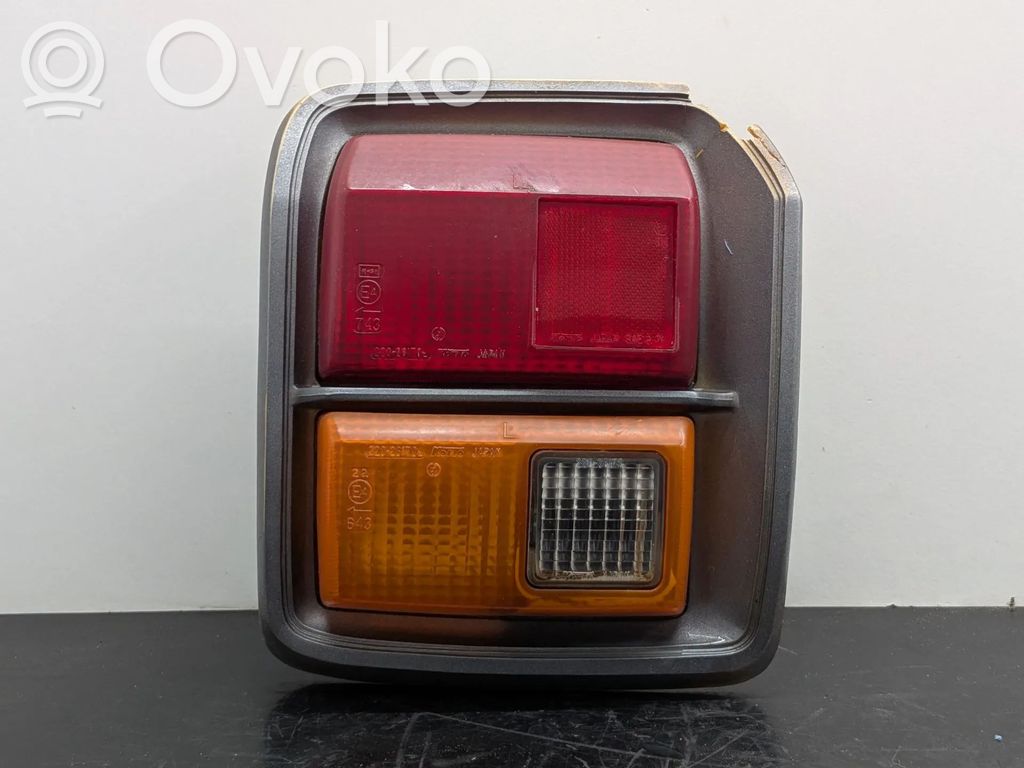 Datsun 100 Lampă spate în capacul portbagajului 