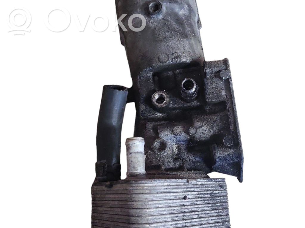 Mocowanie / uchwyt filtra oleju   045115389C,045118466,070115562,1118184,45115389A,45115466A,45115466B,71115562C,MN980125