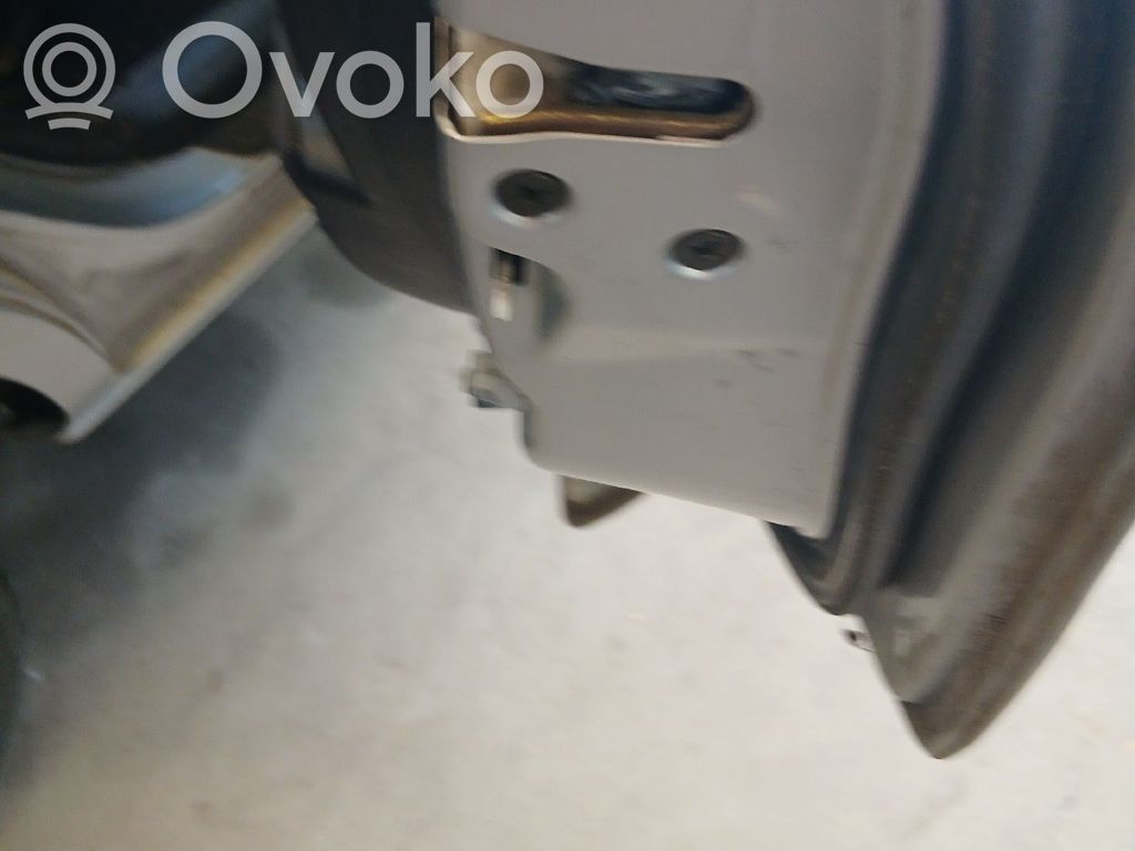 Mazda 2 Zamek drzwi tylnych 