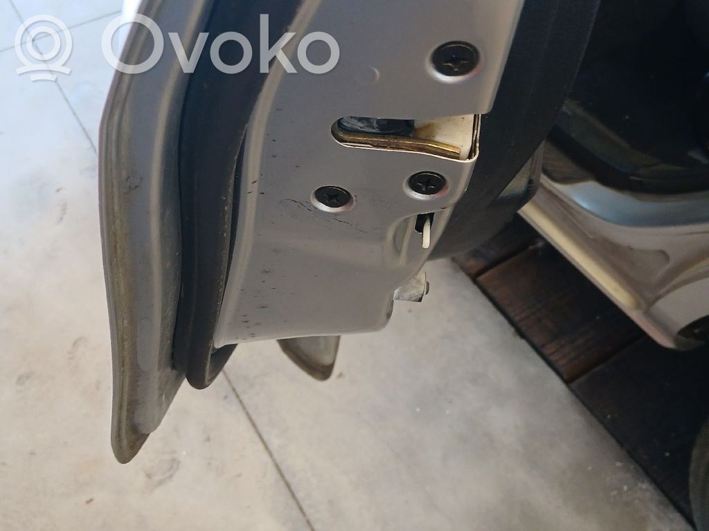 Mazda 2 Galinių durų spyna 