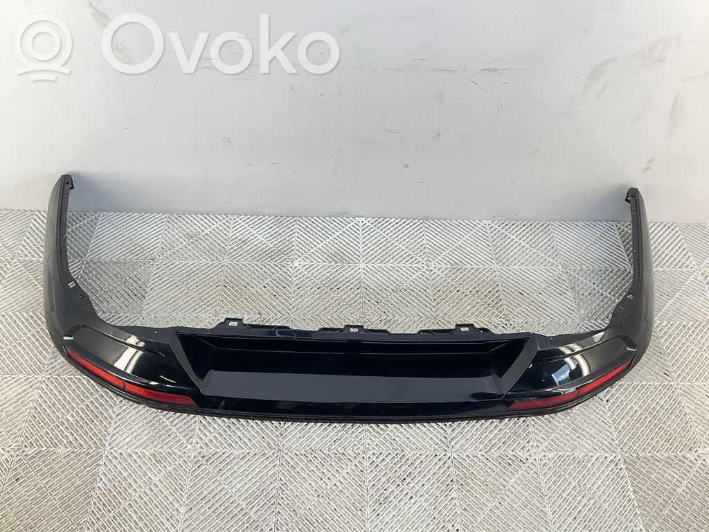 Volkswagen PASSAT B8 Moldura inferior del parachoques trasero 