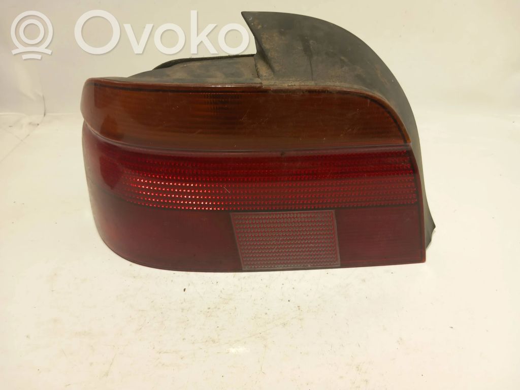 BMW 5 E39 Takavalon polttimon suojan pidike 