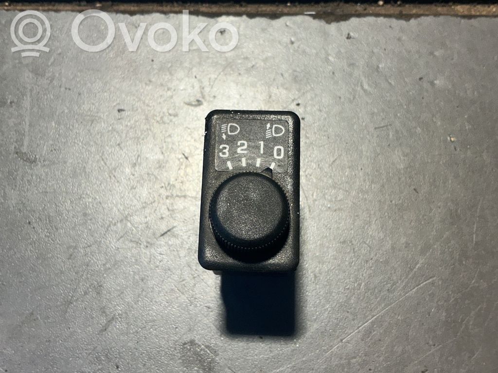 Nissan Terrano Interruptor de control de altura del faro delantero 