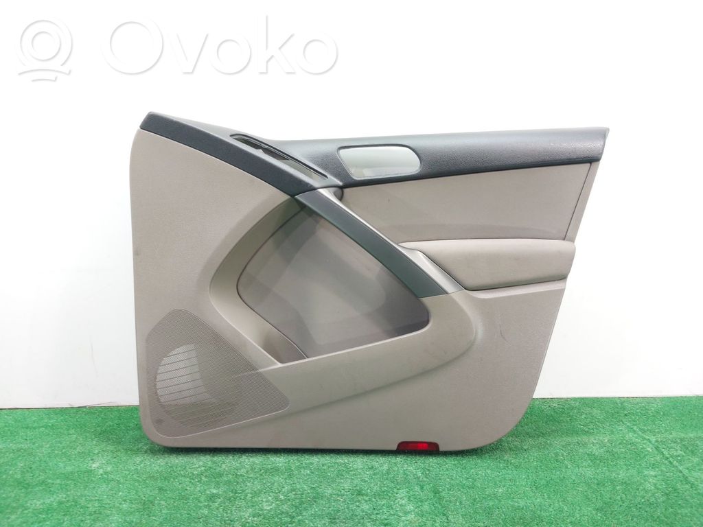 Volkswagen Tiguan Rivestimento del pannello della portiera anteriore
