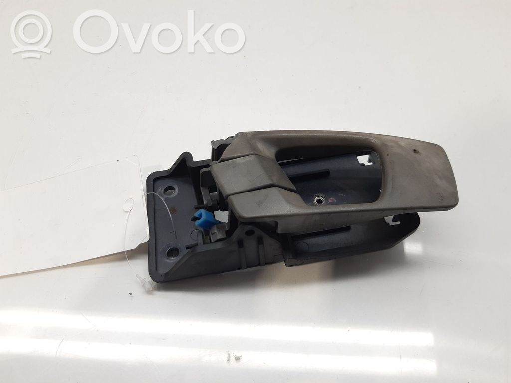 KIA Carens I Manecilla interna puerta delantera