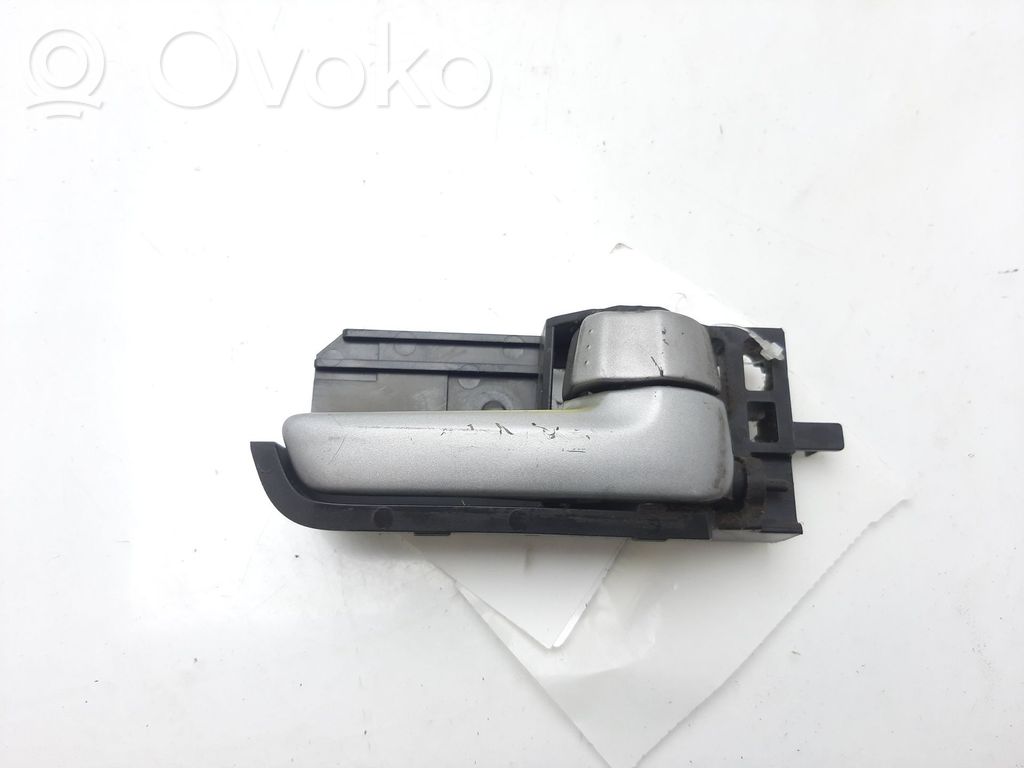Suzuki Swift I Front door interior handle 
