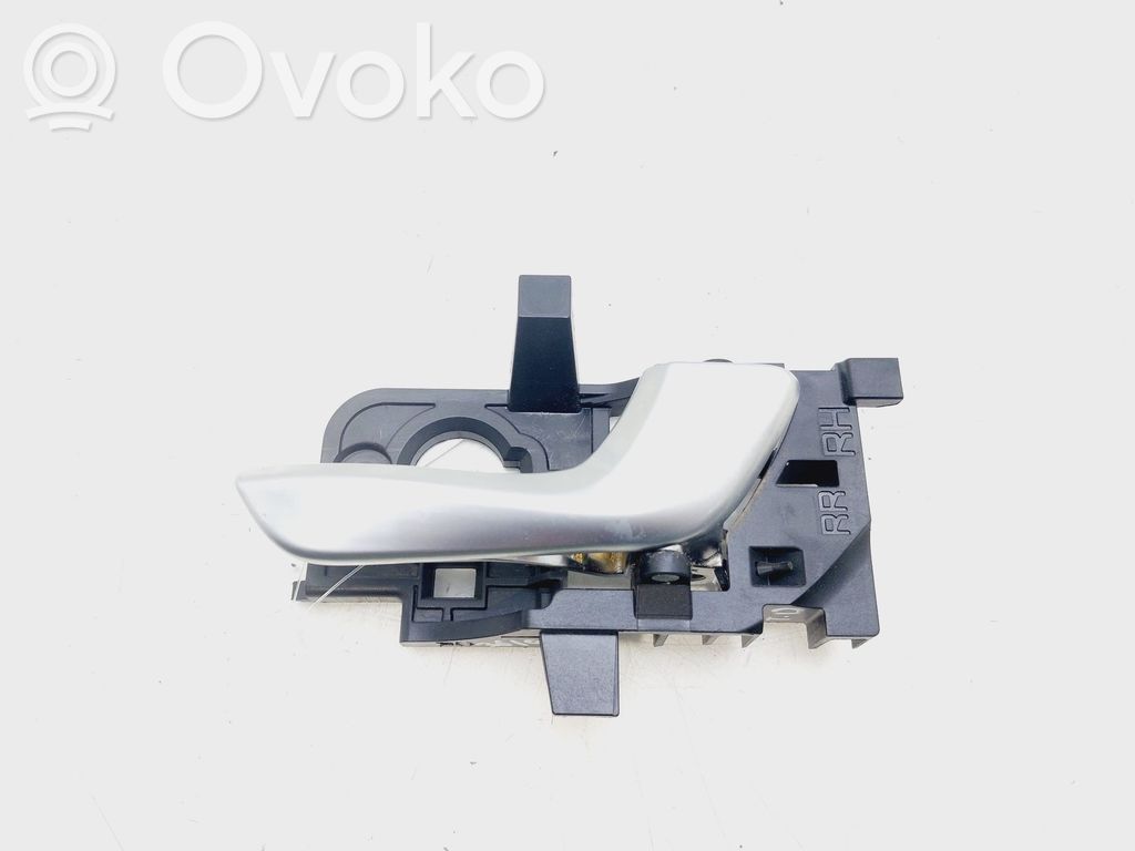 KIA Stonic Manecilla interna puerta trasera 