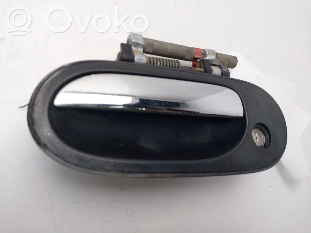 Nissan Almera N16 Manecilla externa puerta delantera