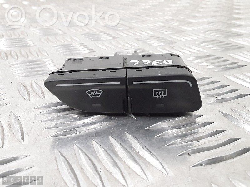 Windscreen/window heater switch   AM5T18K574AB