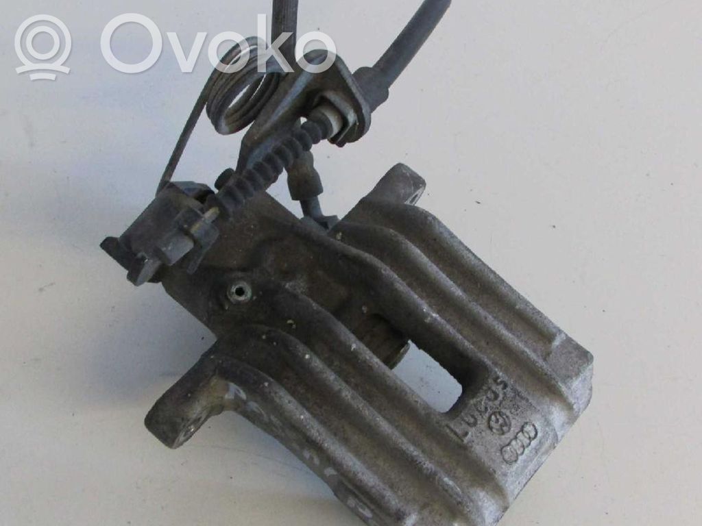 Volkswagen PASSAT B5 Tylny zacisk hamulcowy 