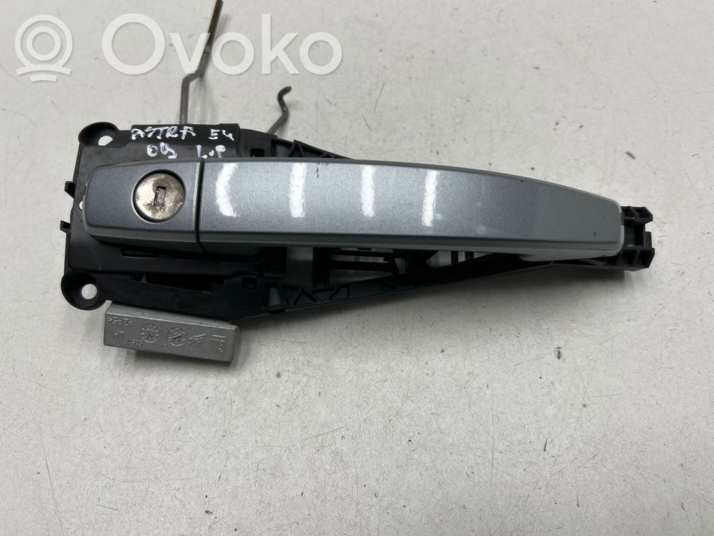 Opel Astra J Front door exterior handle 