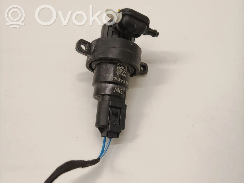 BMW iX Windshield washer spray nozzle 