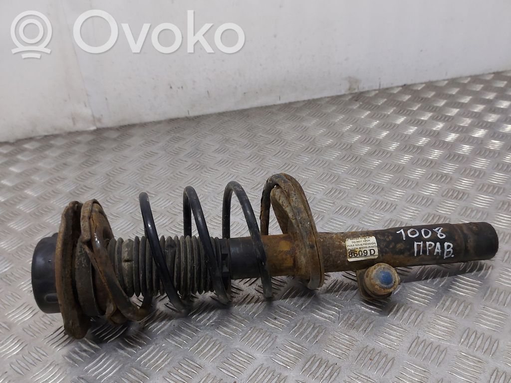 Front shock absorber with coil spring