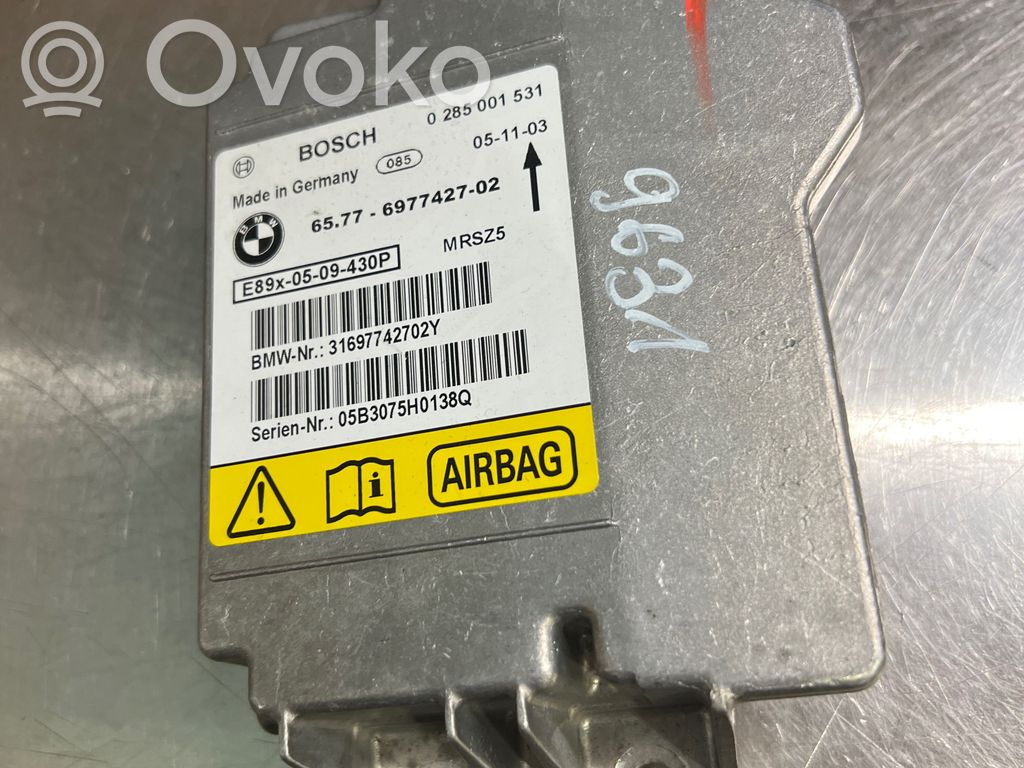 Module de contrôle airbag   6977427,0285001,31697742702Y,05B3075H0138Q