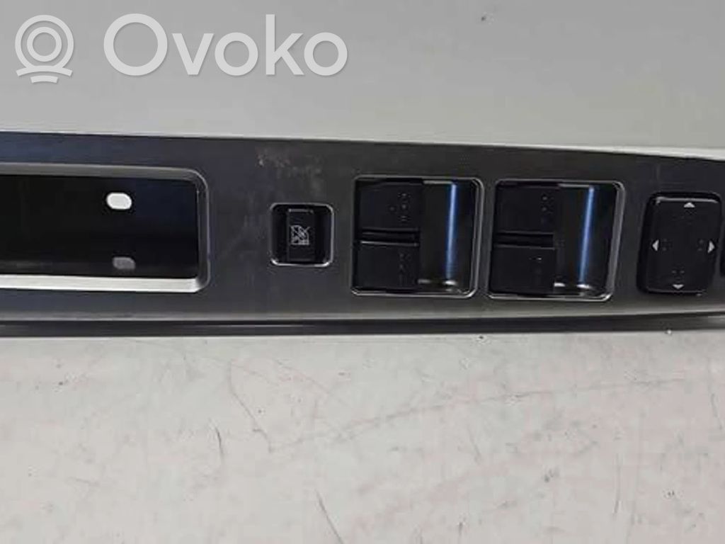 Mazda 5 Front door window switch trim 