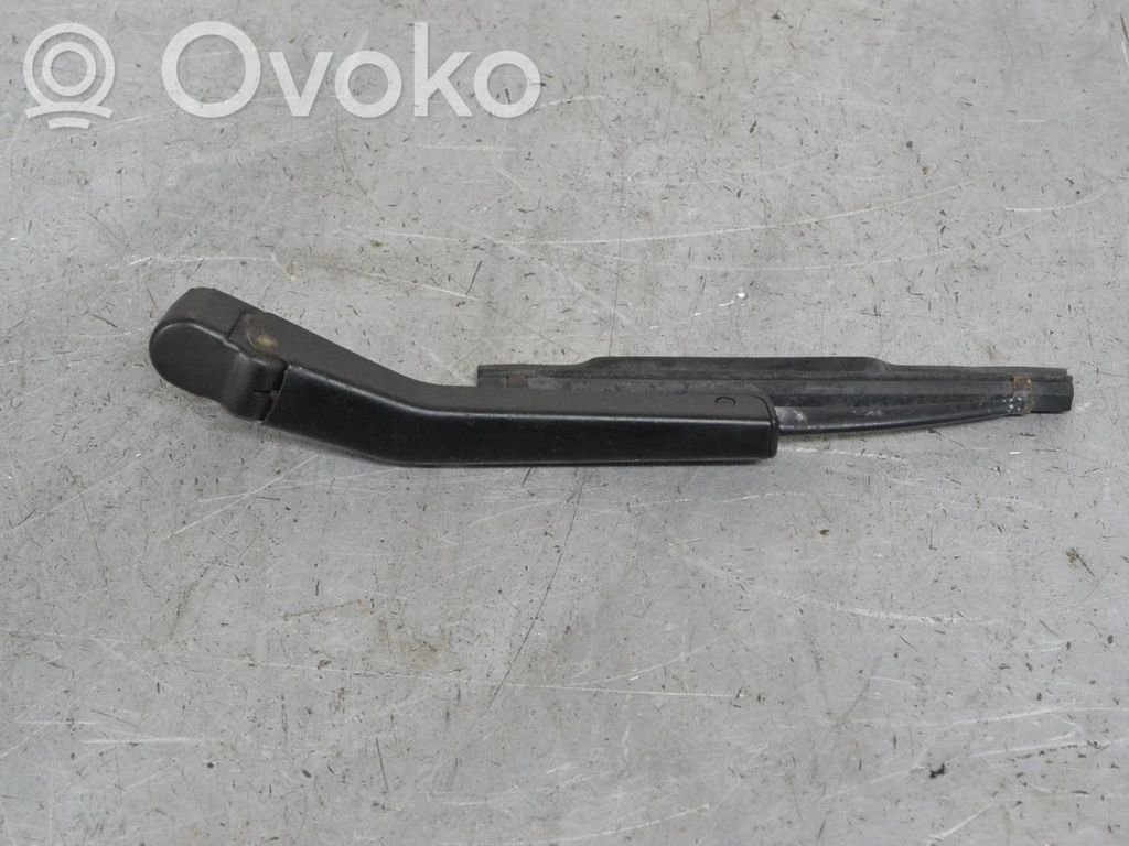 Headlight wiper arm