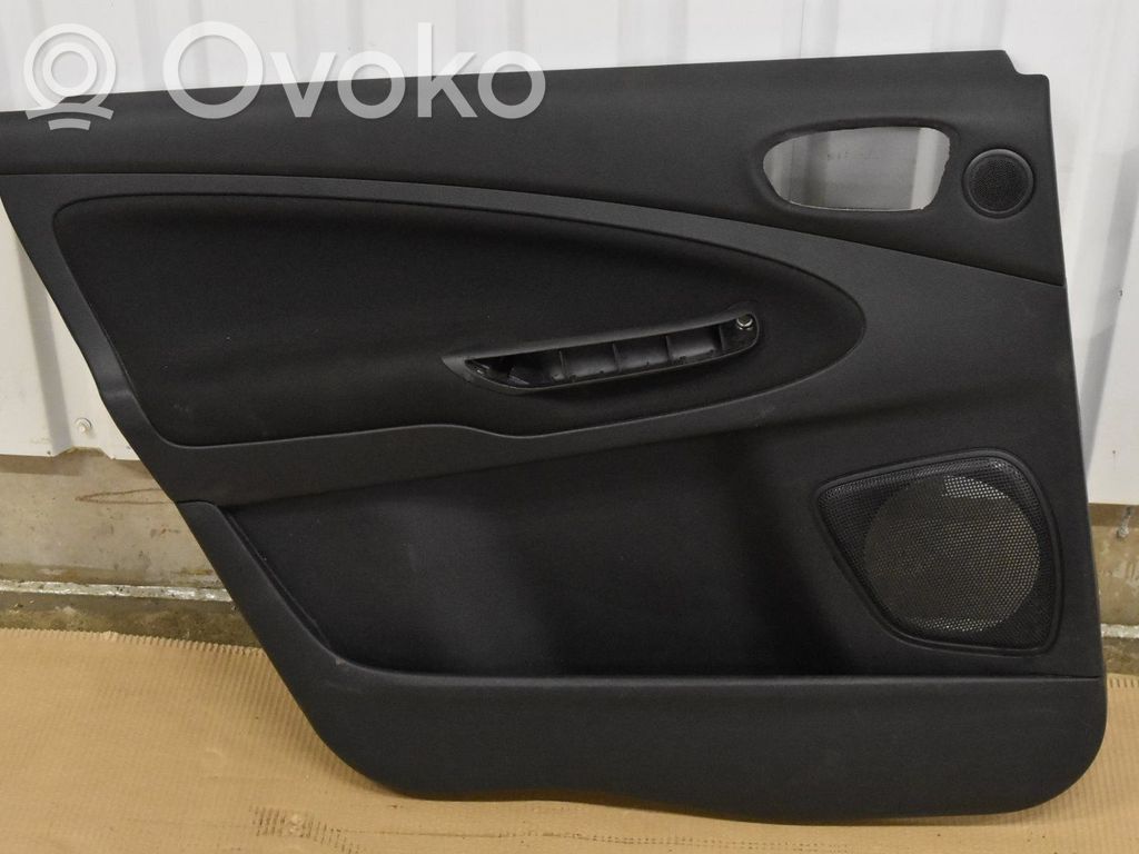 Front door card panel trim   AM21U27407BA