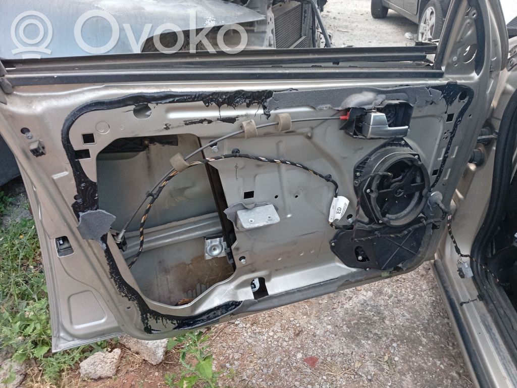 Ford Mondeo Mk III Manualny podnośnik szyby drzwi przednich 