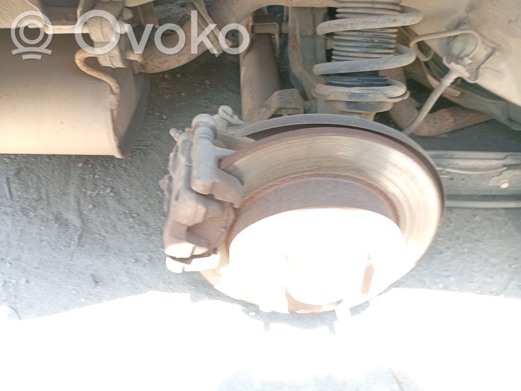 Nissan Almera N16 Support d'étrier arrière
