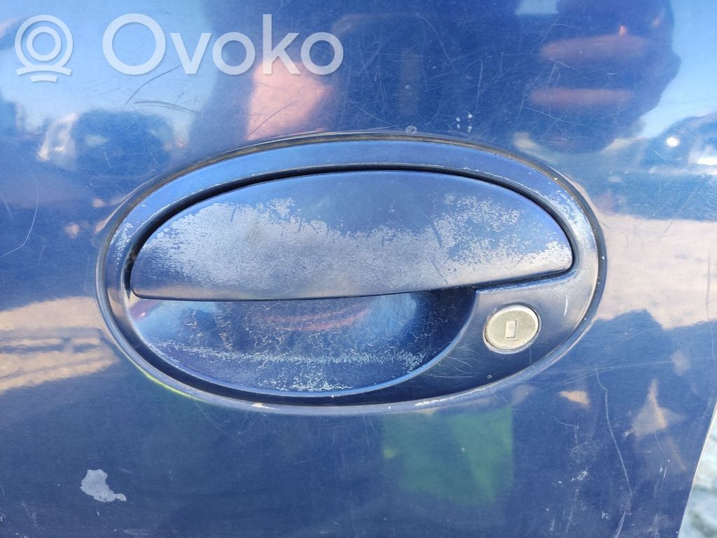 Opel Meriva A Manecilla externa puerta delantera 