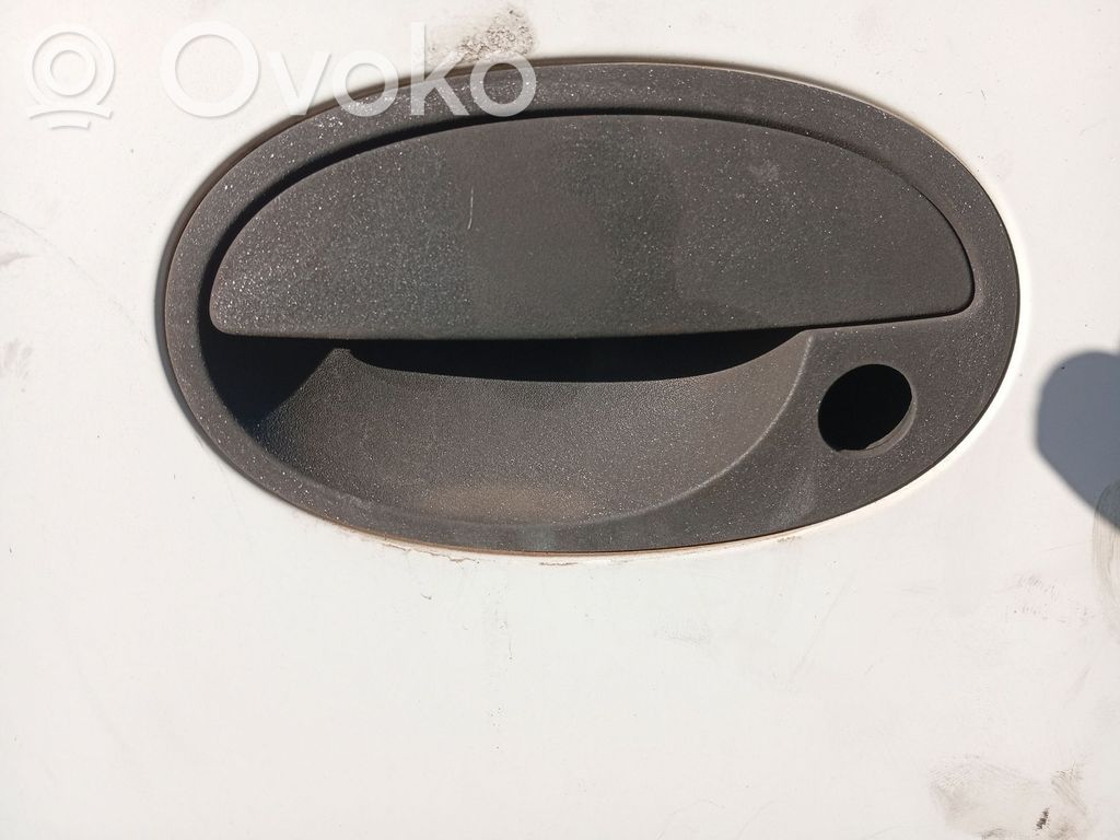 Opel Combo C Manecilla externa puerta delantera 