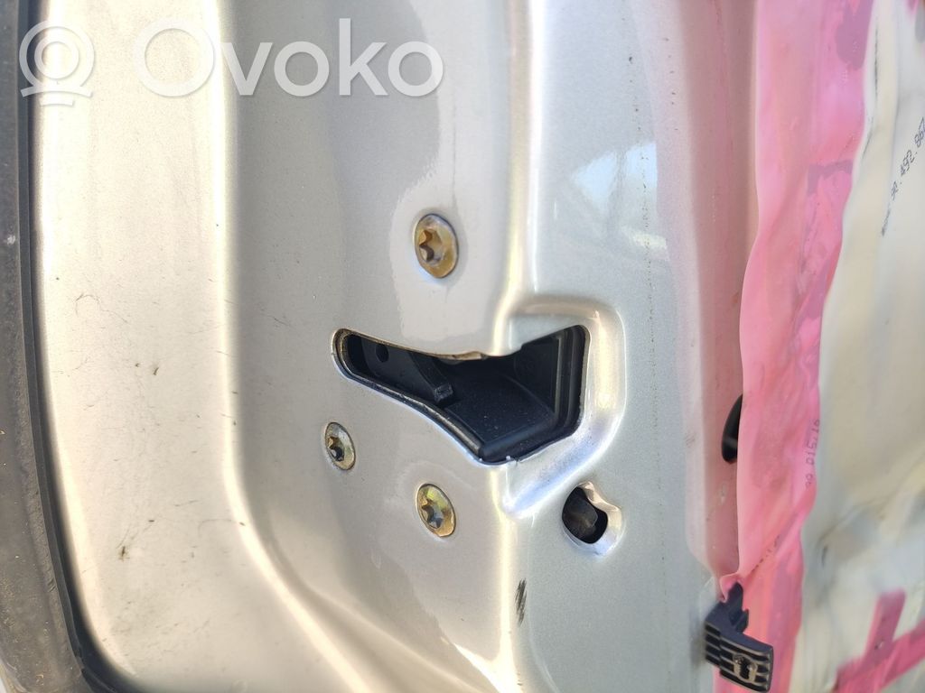 Opel Omega B1 Galinių durų spyna 