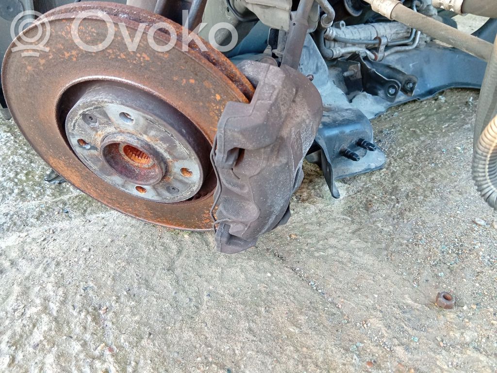 Citroen C4 Grand Picasso Zacisk hamulcowy przedni 