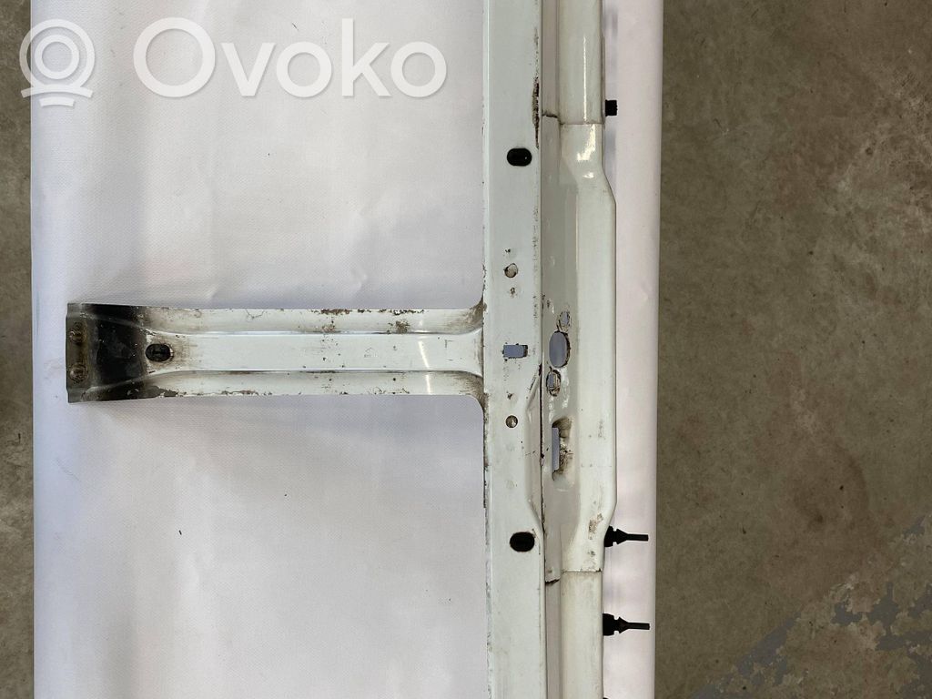 Top upper radiator support slam panel