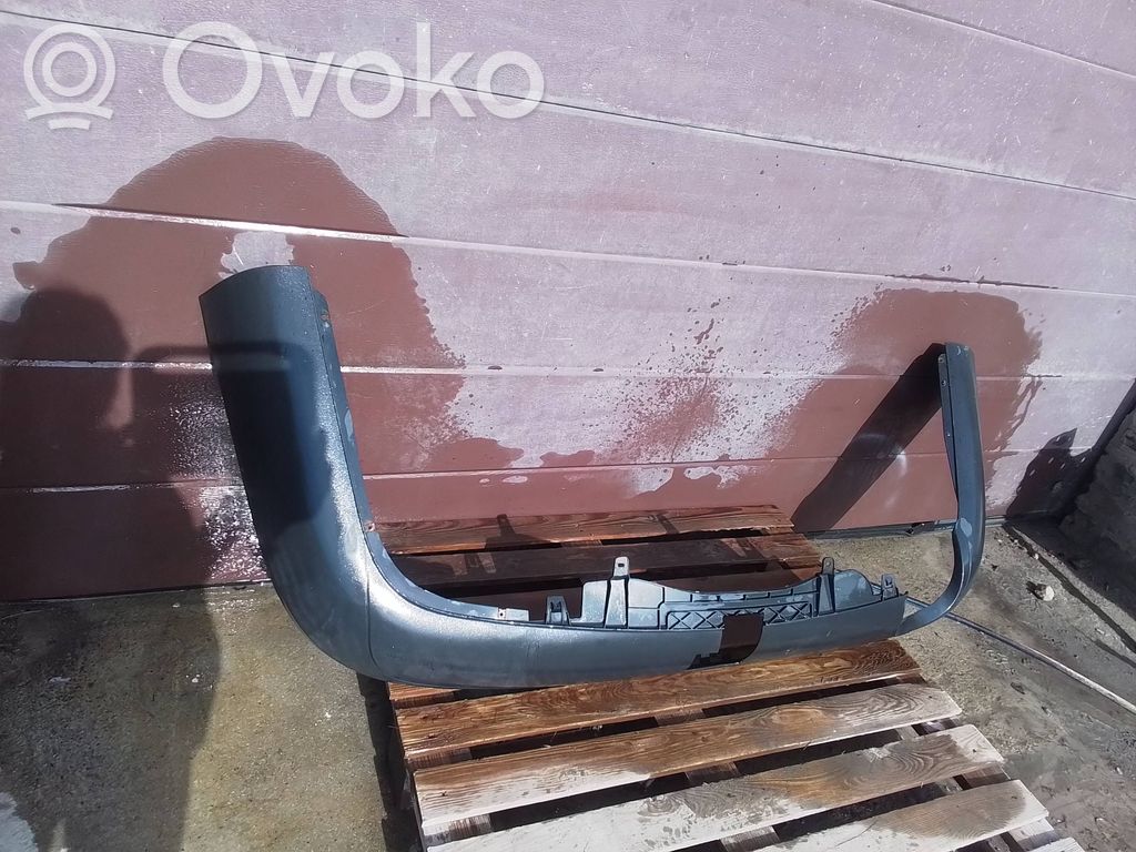 Volkswagen PASSAT B6 Moldura inferior del parachoques trasero 