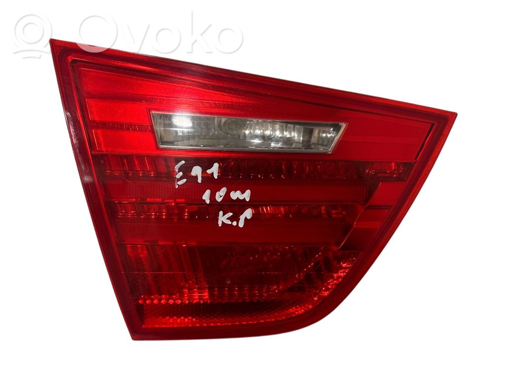 BMW 3 E90 E91 Aizmugurējais lukturis pārsegā 